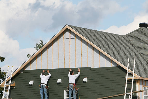 Professional Siding Contractor technician working in Wakeman, OH